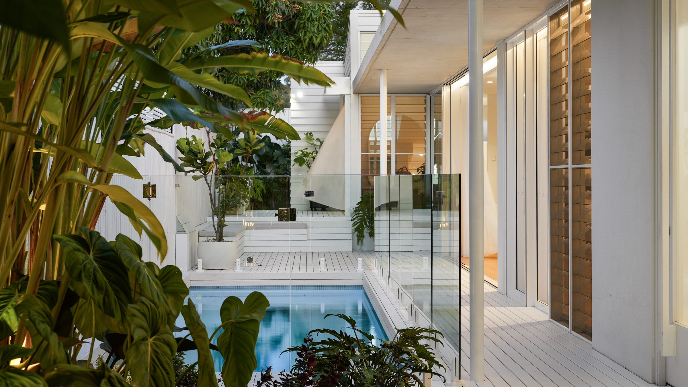 Pool detail through the planting